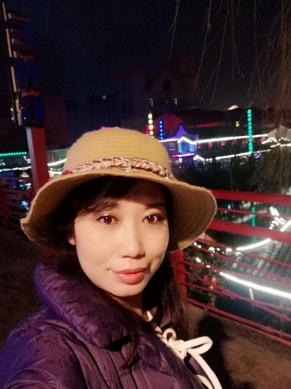 阳光明媚的第一张照片--青岛相亲服务中心