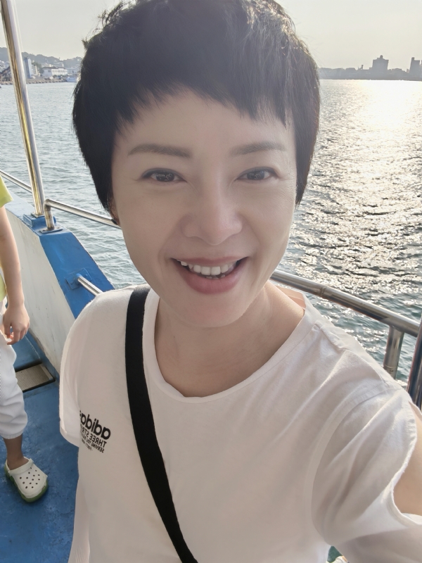 Tina的第一张照片--青岛相亲服务中心